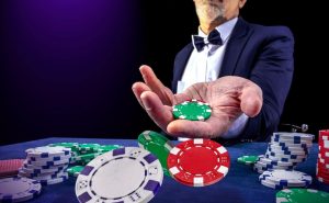 Casino dealer presenting poker chips