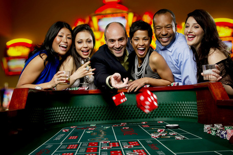 Friends playing roulette at a casino table